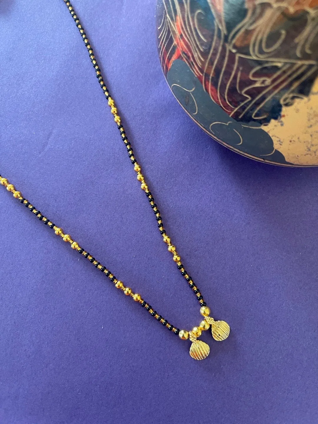 Maharashtrian Style Simple Gold Short Mangalsutra Vati Designs Gold And Black Beads Chain